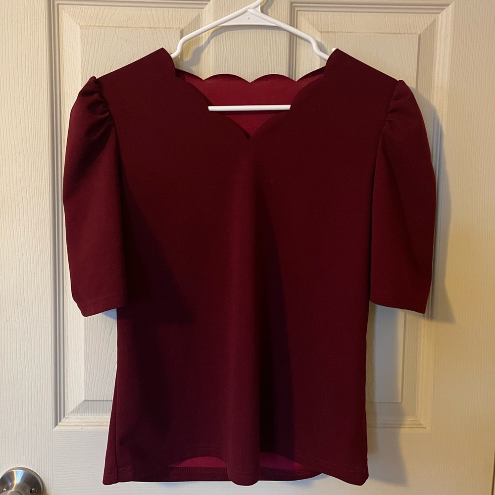 Red blouse.